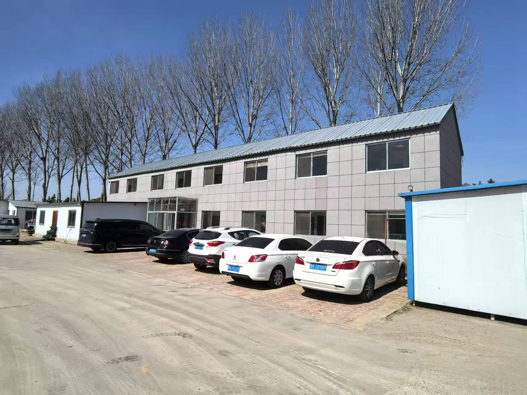 文登開發(fā)區(qū)廣州路東首二層小樓及附屬倉儲用房空礦場地低價對外出